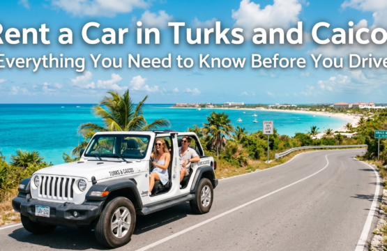 A white open-top Jeep driving on a coastal road in Turks and Caicos with turquoise ocean views and the blog title overlay.